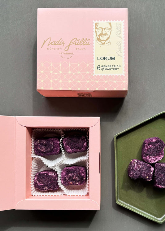 Turkish delight with hazelnut cream and almonds, coated in purple velvet